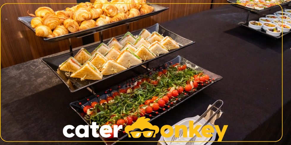 Catering lunch set up at a corporate office with colleagues at the table
